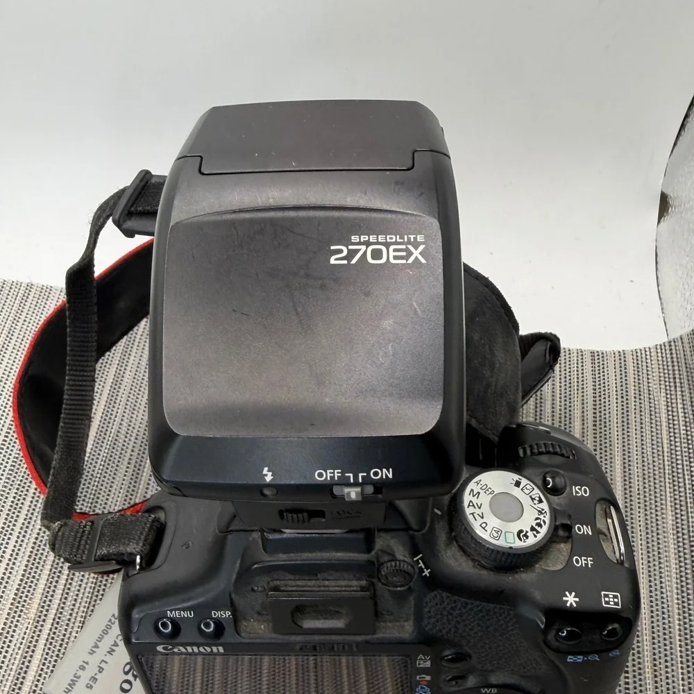 Canon EOS Rebel T1i DSLR Camera 18-55mm IS Lens Speedlite 270EX BG-E5 Bundle
